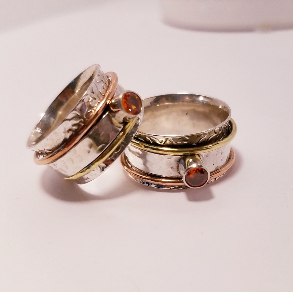{925}garnet spin ring 7, 8